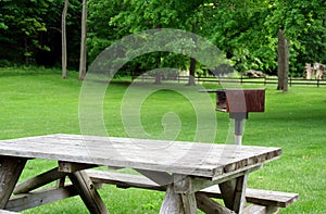 Picnic Table and Grill in Park photo