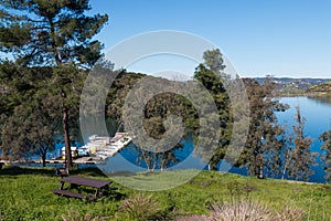 Picnic Table on Hill Overlooking Boat Dock at Lake Jennings