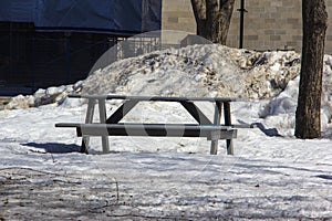 Picnic table on a university campus in winter