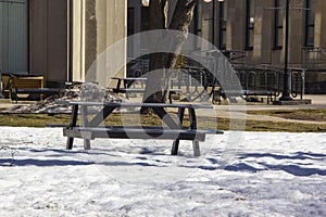 Picnic table on a university campus in winter