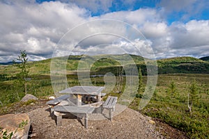 Picnic table with a view on the taiga forest in Les Grands-Jardins National Park, Quebec