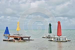 Picnic tables on cloudy day in Belize