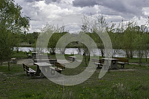 Picnic tables near a river
