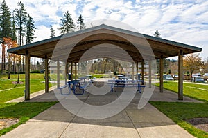 Picnic Tables under Shelter in Suburban City Park