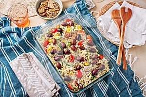 Picnic time - homemade orzo pasta salad with feta, olives, tomatoes