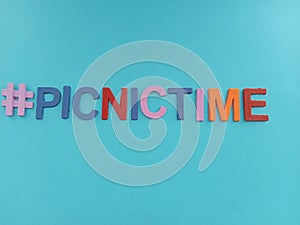 #picnictime picnic time sign on a blue  background