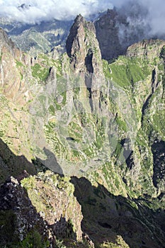 Pico do Arieiro hiking trail, amazing magic landscape with incredible views, rocks and mist