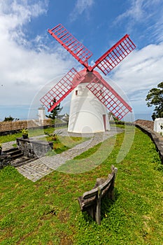 Pico Vermelho windmill on the coast of Sao Miguel Island photo