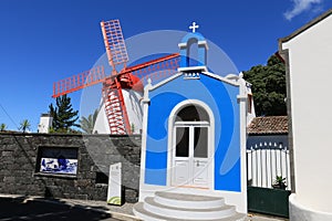 Pico Vermelho windmill on the coast of Sao Miguel Island, Azores photo
