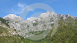 Picos de Europa mountain tops at Cares Gorge trail in Spain photo