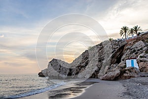 Pictoresque Nerja beach at sunset Malaga Andalusia