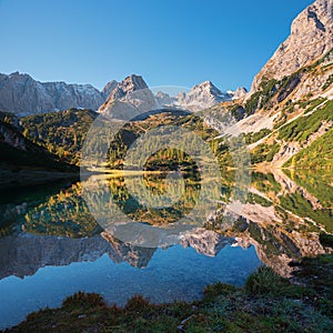 Pictorial alpine landscape lake Seebensee, Mieminger alps, with water reflection