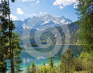 pictorial bavarian alpine landscape, view to lake Eibsee and Zugspitze mountain