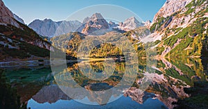 Pictorial colorful autumn landscape, tirolean alps, lake Seebensee and Mieminger Alps