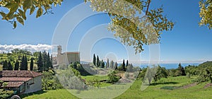 Pictorial landscape above garda lake, sasso church on the hill