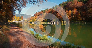 Pictorial walkway round lake Riessersee, sunny day in october, tourist destination Garmisch Grainau