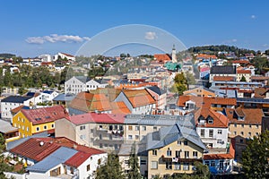 Picture of an aerial view with a drone of the town Grafenau in the Bavarian forest with mountains Arber Rachel and Lusen in the ba