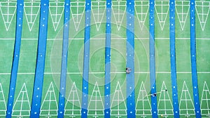 Arial view of a green and blue shuffleboard court