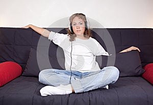 Picture of an attractive woman listening to music in boyfriend`
