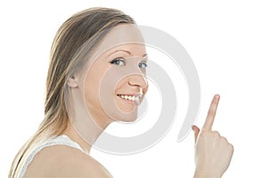 Picture of attractive woman pointing her finger