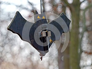 Picture of bat shaped Geocaching hide in the air