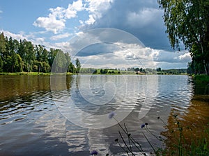 Picture of a beautiful lake and clouds, summer sunny day