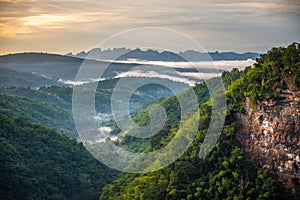 A picture of a beautiful mountain in the morning with fog and sunlight at Nam Nao Canyon, Nam Nao District. Phetchabun Province,