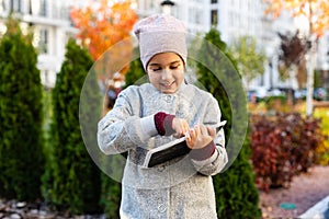 picture of beautiful pre-teen girl with tablet pc