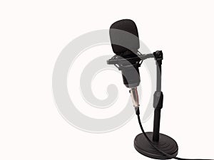 Picture of a black condenser microphone on a white isolated background