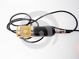 Picture of a black condenser microphone on a white isolated background