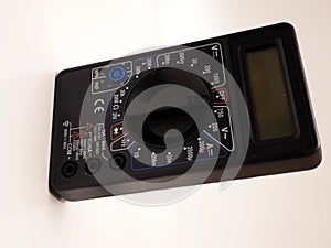 Picture of black digital multimeter or AVO meter for measuring electrical stuff such as voltage, resistance, and current