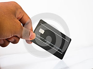 Picture of a black warranty card