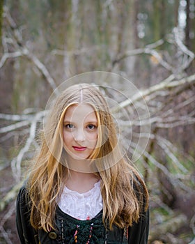 Picture of blonde girl in a vintage folk dress