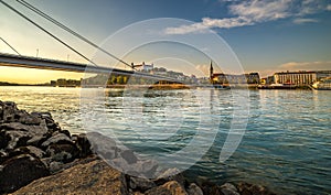 Picture of Bratislava capital city of Slovakia during sunset from petrzalka shore.