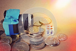 Picture of a Business Money Concept Idea, Photo Camera, dice and Coins