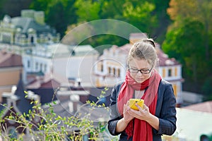 Picture of a businesswoman texting message on the phone