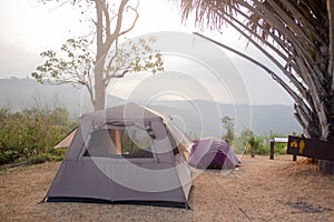 Picture of camping point at morning.Travel, camping and tent in the morning and sky scenery in Thailand. Travel concept