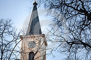 Selective blur on the Church clocktower steeple of the Serbian Roman Catholic Church of Crkva Svetog Karla Boromejskog, also photo