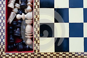 Close-up of chess pieces in the box photo