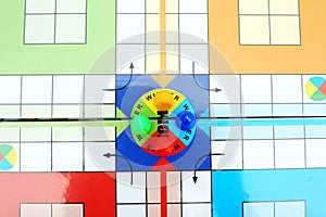 Picture of colorful pawns on the ludo game