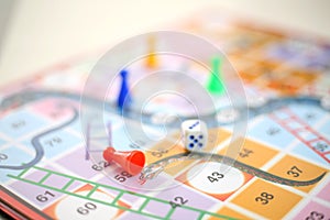 Picture of colorful snakes and Ladders board Game