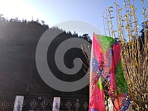 Colourful dupatta flying in mountains. photo