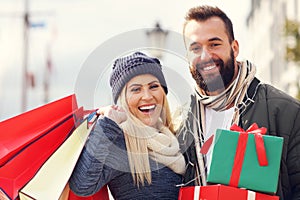 Picture of couple shopping for Christmas in the city