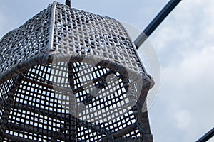 picture of Creative rattan ornaments shaped like lanterns hanging in the garden of a swimming pool