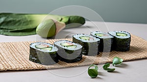 a picture of cucumber sushi on a table