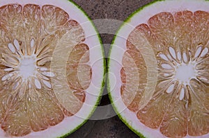 Picture details of juice vesicles and seeds in pomelo cross section