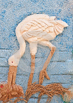 Picture of egret made from rice seed.