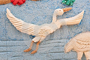 Picture of egret made from rice seed.