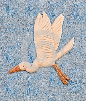 Picture of egret made from rice seed.