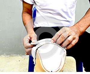 Picture of an elderly man using a prosthetic leg